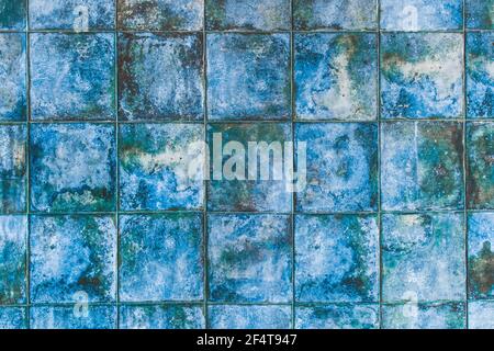 Blue mosaic ceramic tiles with abstract pattern texture background in modern interior. Stock Photo