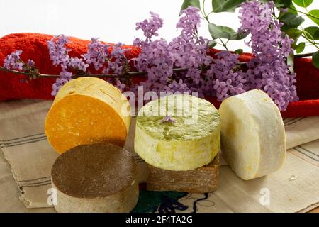 redbud flower and various soaps Stock Photo