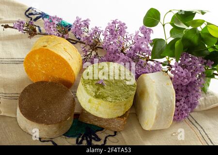 redbud flower and various soaps Stock Photo