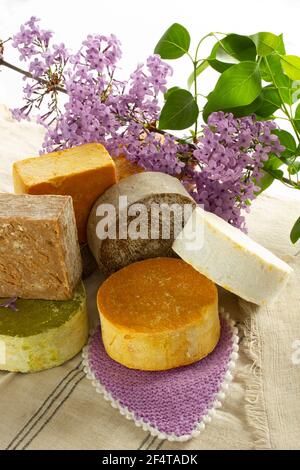 redbud flower and various soaps Stock Photo