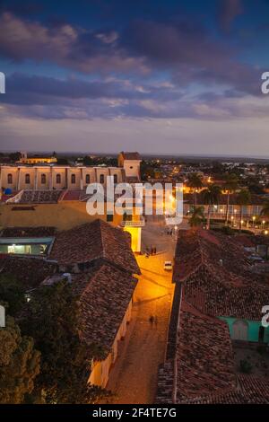 Cuba, Trinidad, View of Trinidad looking towards Iglesia Parroquial de la Santisima Trinidad and Plaza Mayor Stock Photo