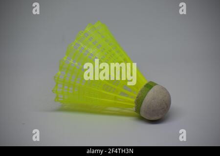 Yellow plastic shuttlecock for badminton Stock Photo