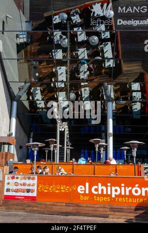 Seaside cafe restaurant 'El chipiron' in seaport of Barcelona, Spain with beautiful reflecton on the roof. Stock Photo