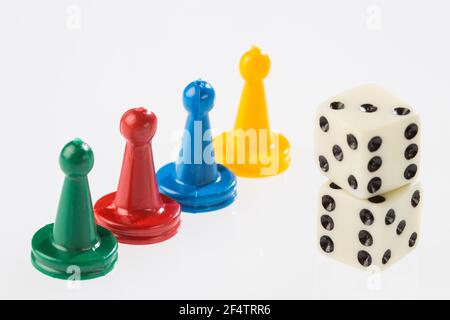 game pieces with dice isolated on white background Stock Photo