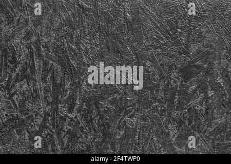 Black painted surface of dark pressed wood chipboard texture background. Stock Photo