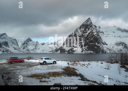 Scenic landscape with Reine village, coast nature with sharp high mountain in the winter Lofoten islands North Norway. Travel destination. Stock Photo