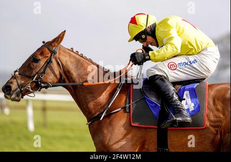 Grandads Cottage ridden by Harry Skelton on their way to winning the Taunton Branch RNLI Supporters Novices' Hurdle at Taunton Racecourse. Picture date: Tuesday March 23, 2021. Stock Photo