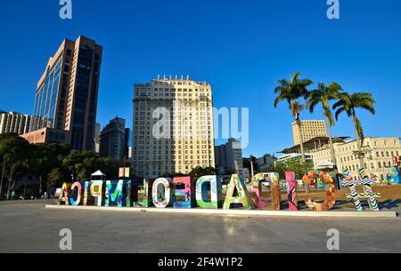 Harbor area view of Mauá Square with the 2016 Olympics colorful city sign artwork and the Skyline on the background in Rio de Janeiro, Brazil. Stock Photo