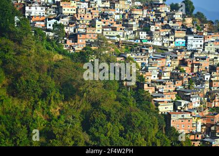 Rocinha favela (slum) and the Christ the Redeemer statue on Corcovado ...