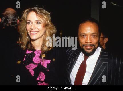 Peggy Lipton and her husband American producer Quincy Jones attend an engagement party for Maria Shriver and Arnold Schwarzenegger, held at Nicky Blair's on the Sunset Strip, Los Angeles, California, February, 1986. Credit: Ralph Dominguez/MediaPunch Stock Photo