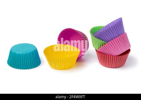 Colorful empty paper cupcake or muffin cups isolated on white background Stock Photo