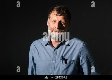 Edimburgh, Scotland. 19 August, 2018. Scottish writer, academic and activist Alastair McIntosh attends a photocall during the Edinburgh International Stock Photo