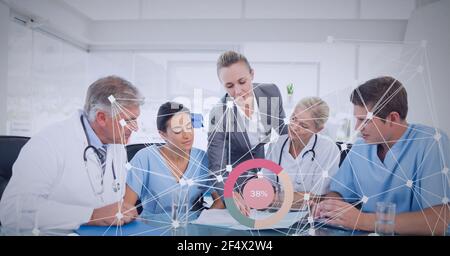 Network of connections against team of doctors an health workers working together. global business and medical research technology concept Stock Photo