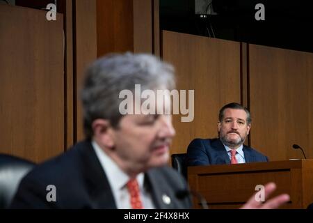 Washington, United States Of America. 23rd Mar, 2021. United States Senator Ted Cruz (Republican of Texas), right, listens while United States Senator John Neely Kennedy (Republican of Louisiana) questions the panel during a Senate Committee on the Judiciary hearing to examine constitutional and common sense steps to reduce gun violence in the Hart Senate Office Building in Washington, DC, Tuesday, March 23, 2021. Credit: Rod Lamkey/CNP/Sipa USA Credit: Sipa USA/Alamy Live News Stock Photo