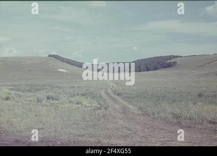 Second World War. Russia, Belgorod Oblast. Battle breaks. Dirt road Stock Photo