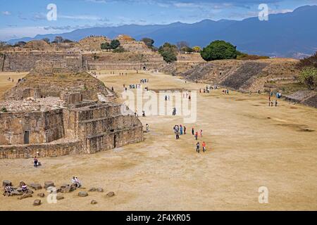 Tourists visiting the Monte Alban pyramid complex, pre-Columbian archaeological site in Santa Cruz Xoxocotlán, Oaxaca, southwestern Mexico Stock Photo