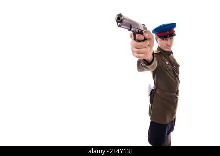 Man actor in the form of an officer captain People's Commissariat of Internal Affairs of Russia from the period 1943-1945 posing on a white background Stock Photo