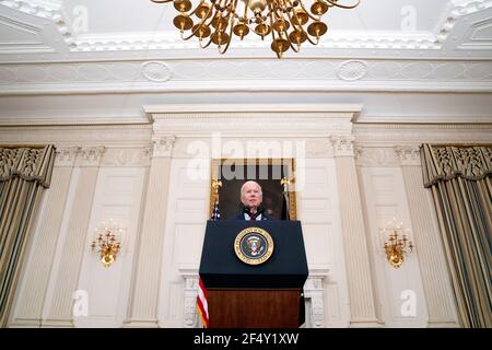 Washington, United States Of America. 23rd Mar, 2021. United States President Joe Biden delivers remarks on the mass shooting in Boulder, Colorado, in the State Dining Room of the White House on Tuesday, March 23, 2021 in Washington, DC, U.S. Credit: Stefani Reynolds/Pool/Sipa USA Credit: Sipa USA/Alamy Live News Stock Photo