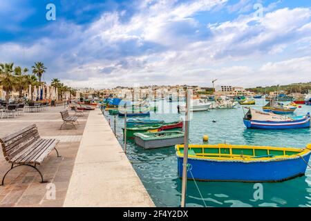 Typical fishing boats at the village of Marsaxlokk on the island of Malta Stock Photo