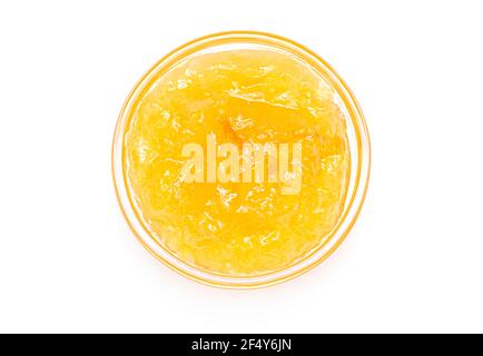 Orange jam in small glass bowl isolated on white Stock Photo