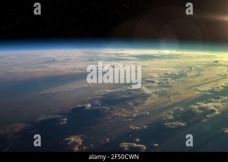 Observation of the planet Earth from space. On the surface of the planet are visible clouds. Earth's atmosphere. Elements of this image furnished by N Stock Photo
