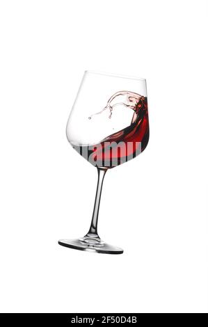 Glass of Red Wine with splash, isolated on white background. Wine with splash. Stock Photo