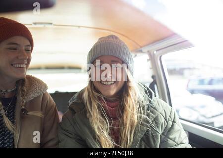 Portrait happy young women friends inside van Stock Photo