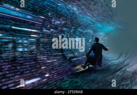 Businessman surfing binary code wave Stock Photo