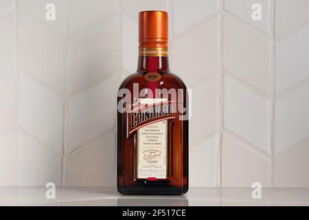 bottle of Cointreau, an orange flavored triple sec liquer, an aperitif or digestif, from Saint-Barthelemy-d'Anjou, France Stock Photo