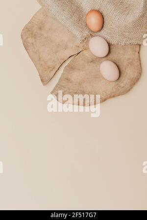 Eggs on old wooden table. Zero waste easter concept. Eco friendly lifestyle, copy space Stock Photo