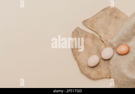 Eggs on old wooden table. Zero waste easter concept. Eco friendly lifestyle, copy space Stock Photo