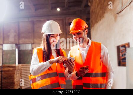 Video chat with engineers and workers discuss production plans Stock Photo