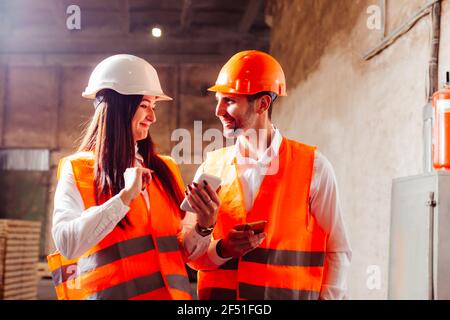 Video chat with engineers and workers discuss production plans Stock Photo