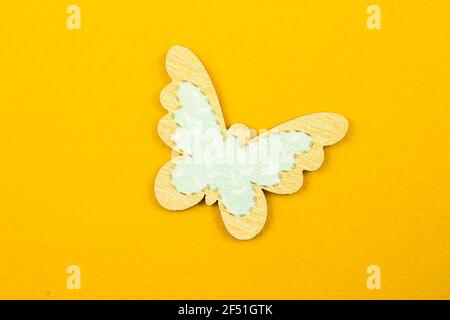 Wooden butterfly decoration, flat lat spring background concept Stock Photo