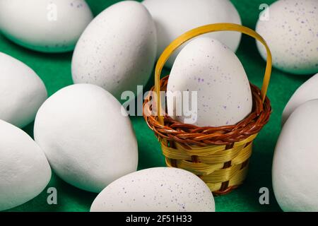Large White And Speckled Candy Easter Eggs With Basket Stock Photo