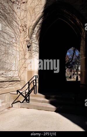 Chicago, Illinois, USA. Composition representing an invitation to leave the shadows of ignorance for the light of an informed education. Stock Photo