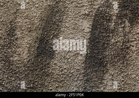 Smears on the rough stone wall background Stock Photo