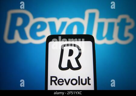 Ukraine. 23rd Mar, 2021. In this photo illustration, Revolut logo of a financial technology company is seen displayed on a smartphone and a pc screen. (Photo by Pavlo Gonchar/SOPA Images/Sipa USA) Credit: Sipa USA/Alamy Live News Stock Photo