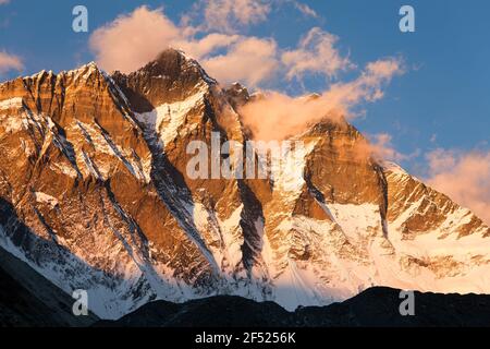 evening view of Lhotse and clouds on the top - way to mount Everest base camp - Nepal Stock Photo