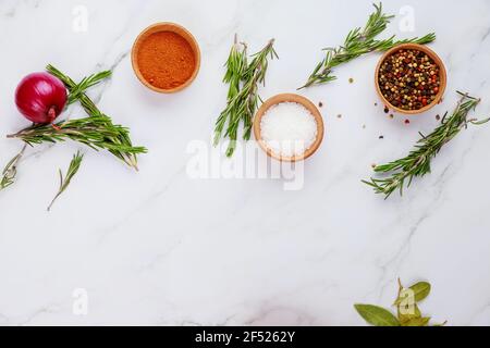Various herbs and spices on white background. Top view. Stock Photo