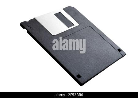Obsolete data storage technology, retro digital medium and nostalgia concept with a tilted floppy disk isolated on white background leaning on its axi Stock Photo