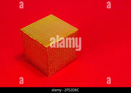 Christmas Gift Box On Red Background Stock Photo