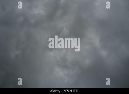 Cumulonimbus cloud formations on tropical sky , Nimbus moving , Abstract background from natural phenomenon and gray clouds hunk Stock Photo