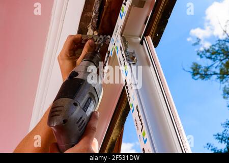 Dolyna, Ukraine July 31, 2020: installation and replacement of a plastic window, windows from wds, plastic window frame.new Stock Photo