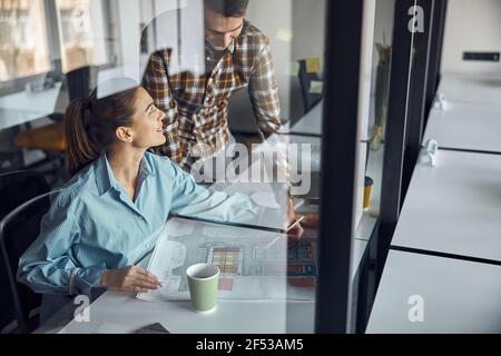 Two architects creating a new building plan Stock Photo