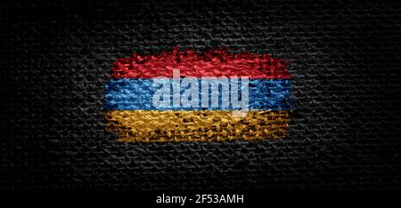 National flag of the Armenia on dark fabric Stock Photo