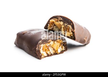 Chocolate bars with nuts filling isolated on white background. Stock Photo