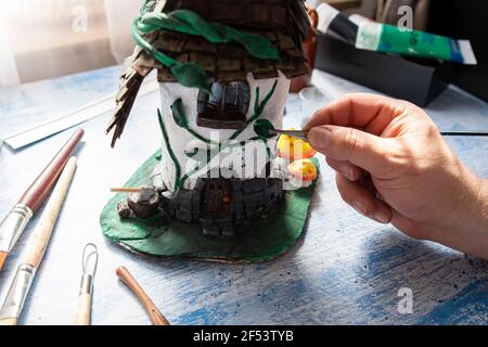 Clay Model  Building handcraft on table with different materials Stock Photo