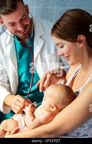 Pediatric doctor exams little baby. Health care, medical examination ...