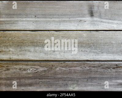 Three horizontal natural wooden panels light and silver in colour Stock Photo